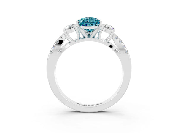 White gold Pear Cut Blue Topaz Three-Stone Ring with Pavé Split Shank and Four-Prong Setting