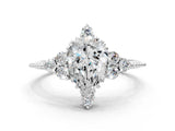 White gold Pear Cut Brilliant Diamond with Cluster Setting on a Beaded Band and Four-Prong Setting_161