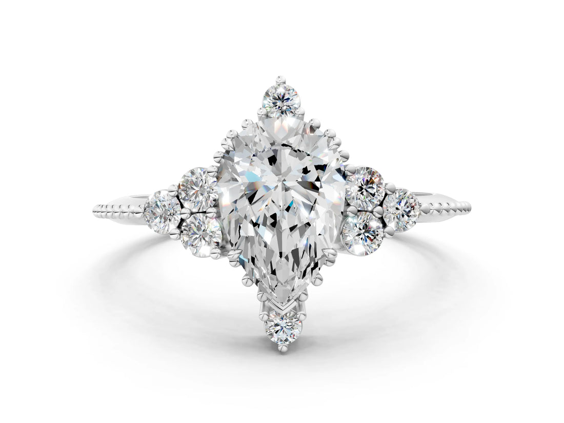 White gold Pear Cut Brilliant Diamond with Cluster Setting on a Beaded Band and Four-Prong Setting_7