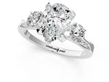 White gold Pear Cut Brilliant Three-Stone Diamond Ring with Pavé Band and Four-Prong Setting_8
