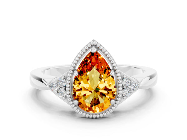 Platinum Pear Cut Citrine Halo Ring with Tapered Band and Four-Prong Setting