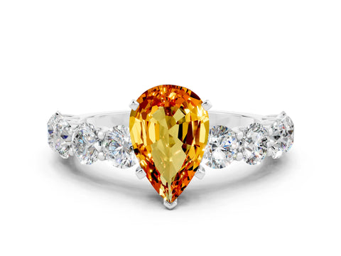 White gold Pear Cut Citrine Prong Setting with Side Stones on a Pave Band