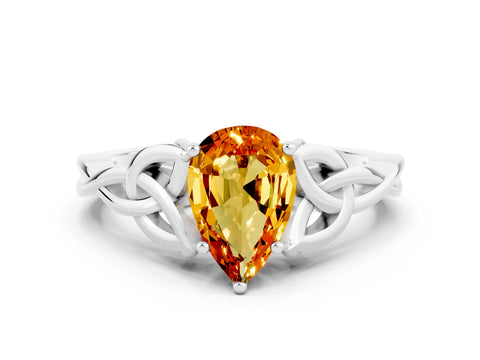 White gold Pear Cut Citrine Solitaire Engagement Ring with Celtic Knot Band and Four-Prong Setting