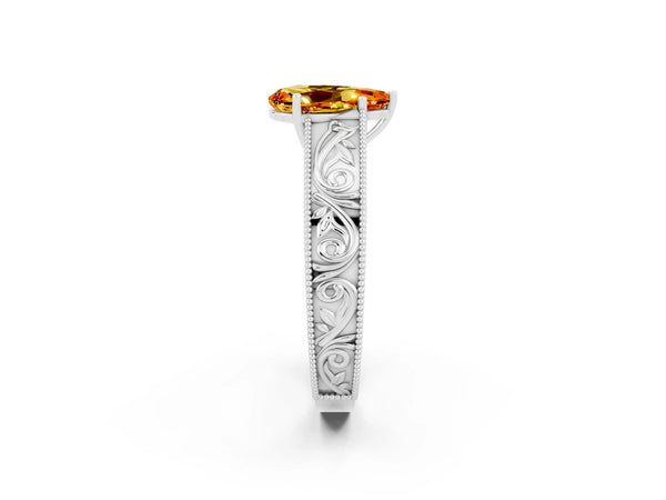Platinum Pear Cut Citrine Solitaire Ring with Engraved Band and Four-Prong Setting