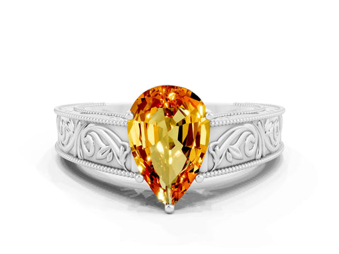 White gold Pear Cut Citrine Solitaire Ring with Engraved Band and Four-Prong Setting