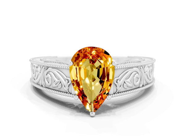 White gold Pear Cut Citrine Solitaire Ring with Engraved Band and Four-Prong Setting