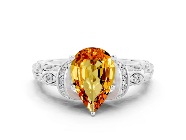 White gold Pear Cut Citrine Solitaire Ring with Filigree Band and Four-Prong Setting