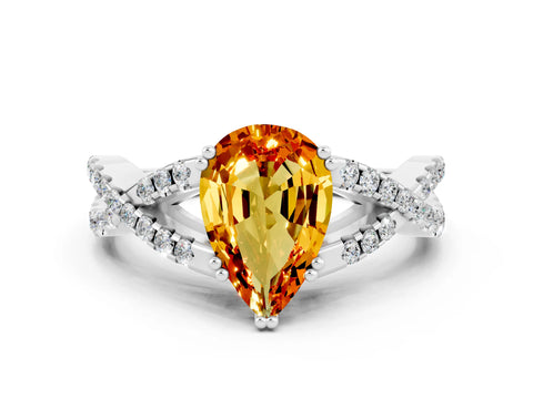 White gold Pear Cut Citrine Solitaire Ring with Four-Prong Setting and Twisted Pavé Band