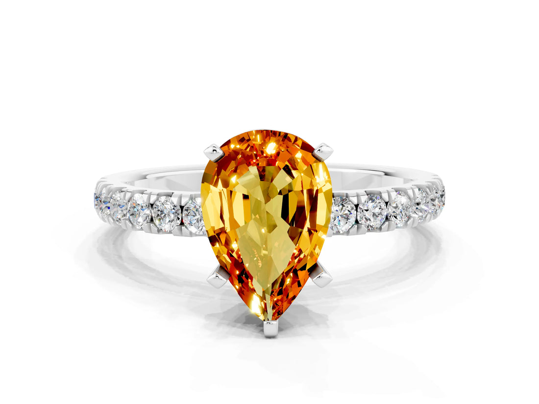 White gold Pear Cut Citrine Solitaire Ring with Pavé Accents and Four-Prong Setting