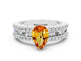 White gold Pear Cut Citrine Solitaire Ring with Pavé and Channel Set Band