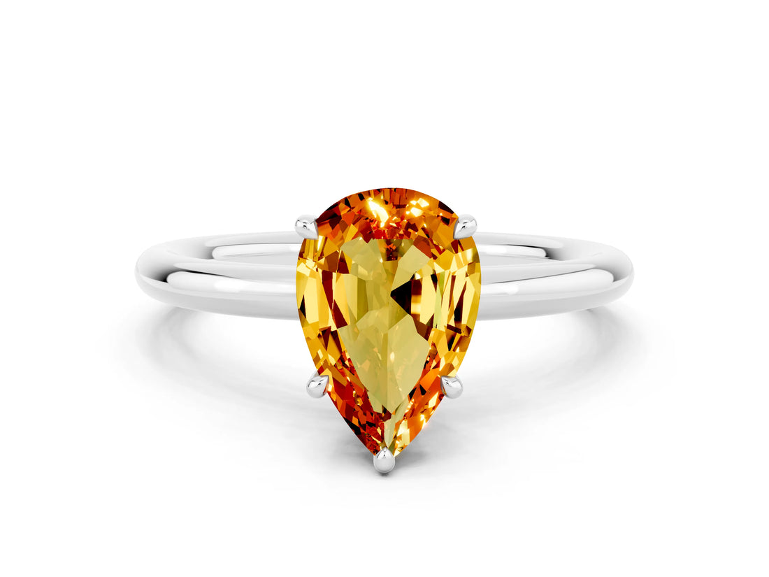 White gold Pear Cut Citrine Solitaire Ring with Thin Band and Four-Prong Setting