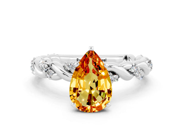 Silver Pear Cut Citrine Solitaire Ring with Twisted Band and Pavé Accents