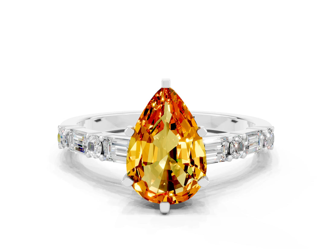 White gold Pear Cut Citrine Solitaire with Side Baguettes and Channel Set Band