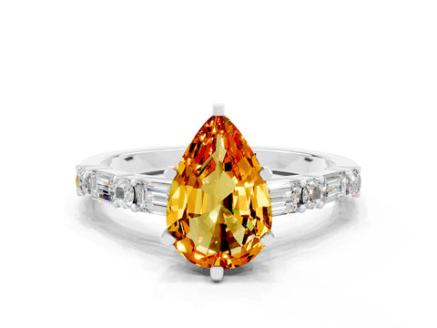 White gold Pear Cut Citrine Solitaire with Side Baguettes and Channel Set Band