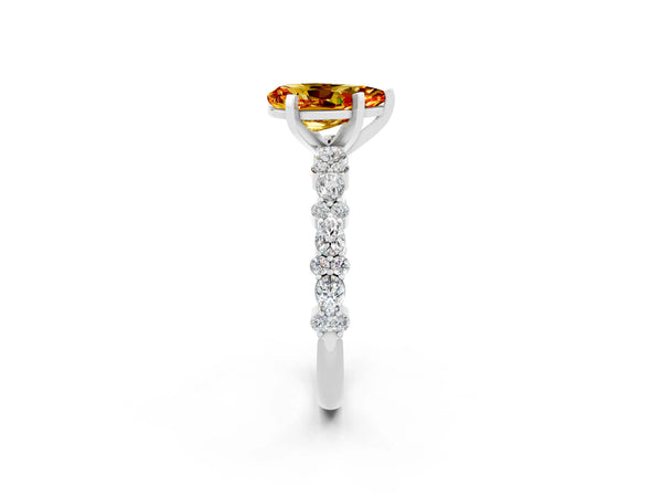 Platinum Pear Cut Citrine Side Stone Solitaire Ring with Round  and Four-Prong Setting