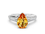 White gold Pear Cut Citrine Split Shank Engagement Ring with Pavé Band