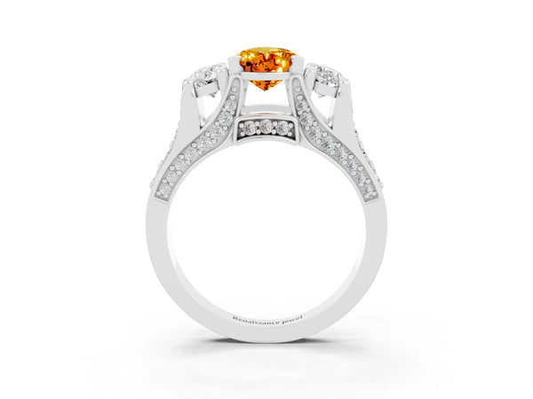 Platinum Pear Cut Citrine Three-Stone Ring with Channel Set Band and Four-Prong Setting