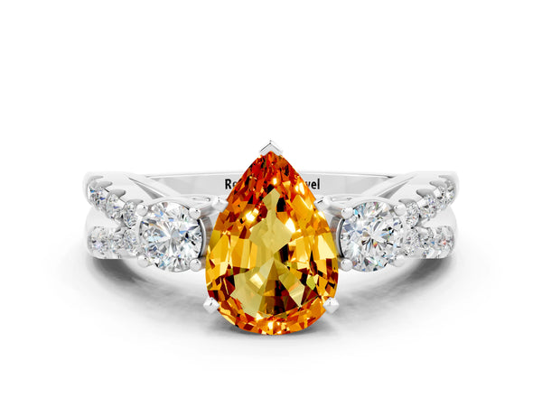 Platinum Pear Cut Citrine Three-Stone Ring with Pavé Split Shank and Four-Prong Setting