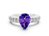 White gold Pear Cut Cut Channel Set Diamond Engagement Ring with Four-Prong Setting