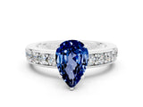 White gold Pear Cut Cut Channel Set Diamond Engagement Ring with Four-Prong Setting