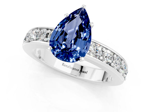 Silver Pear Cut Blue Sapphire Engagement Ring with Channel Set Round  Band and Prong Setting