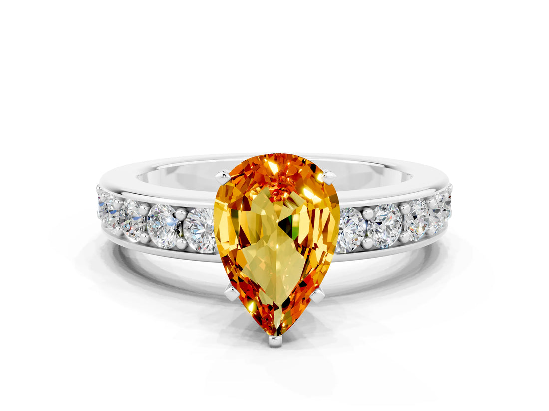 White gold Pear Cut Cut Channel Set Diamond Engagement Ring with Four-Prong Setting