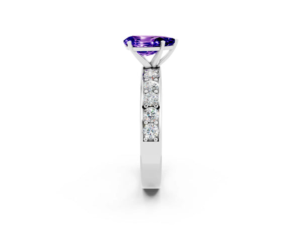 White gold Pear Cut Tanzanite Engagement Ring with Channel Set Round  Band and Prong Setting