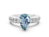 White gold Pear Cut Cut Channel Set Diamond Engagement Ring with Four-Prong Setting