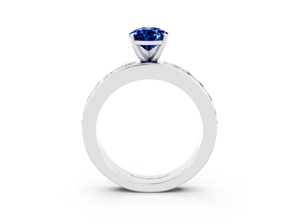 Silver Pear Cut Blue Sapphire Engagement Ring with Channel Set Round  Band and Prong Setting