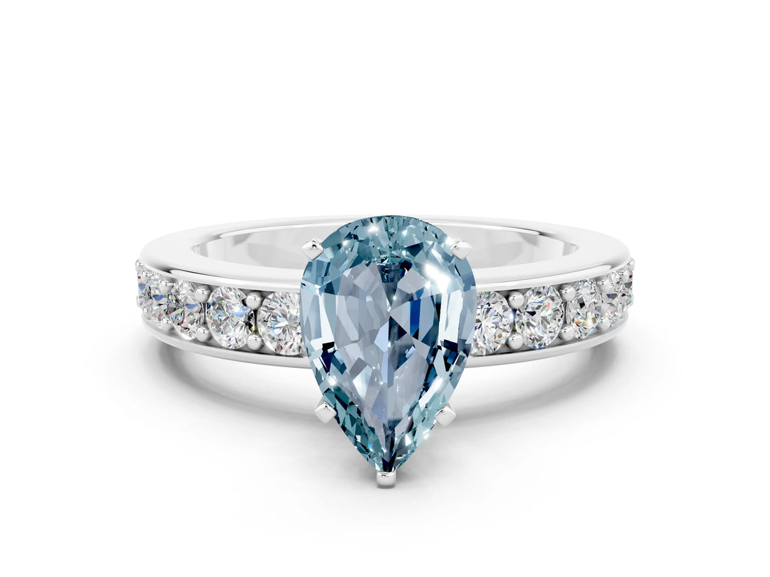 White gold Pear Cut Cut Channel Set Diamond Engagement Ring with Four-Prong Setting