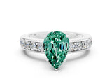 White gold Pear Cut Cut Channel Set Diamond Engagement Ring with Four-Prong Setting