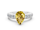 White gold Pear Cut Cut Channel Set Diamond Engagement Ring with Four-Prong Setting