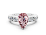 White gold Pear Cut Cut Channel Set Diamond Engagement Ring with Four-Prong Setting