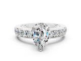 White gold Pear Cut Cut Channel Set Diamond Engagement Ring with Four-Prong Setting