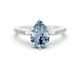 White gold Pear Cut Cut Channel Set Solitaire Engagement Ring with Four-Prong Setting