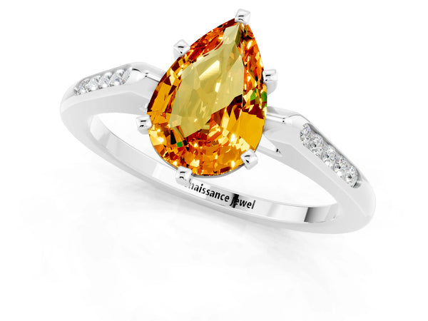 Platinum Pear Cut Citrine Solitaire Ring with Channel Set Round Band and Prong Setting