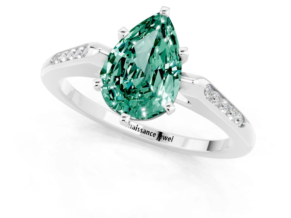 White gold Pear Cut Green Sapphire Solitaire Ring with Channel Set Round Band and Prong Setting