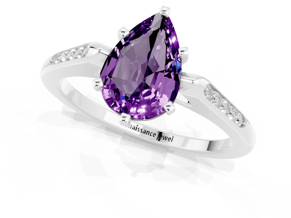 Platinum Pear Cut Amethyst Solitaire Ring with Channel Set Round Band and Prong Setting