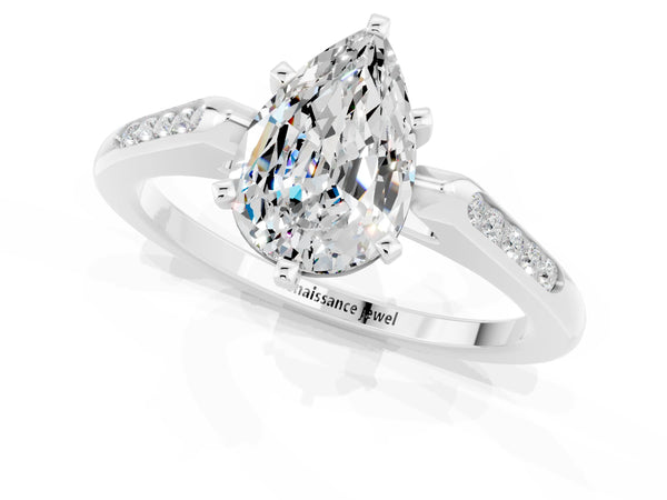 White gold Pear Cut Moissanite Solitaire Ring with Channel Set Round Band and Prong Setting