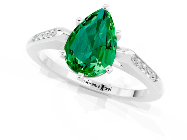 Platinum Pear Cut Emerald Solitaire Ring with Channel Set Round Band and Prong Setting