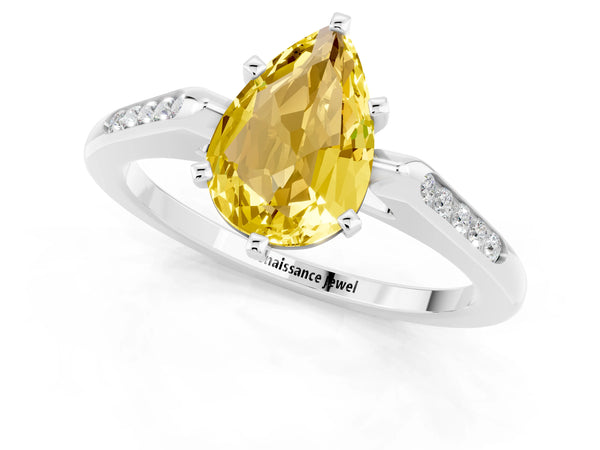 Platinum Pear Cut Yellow Sapphire Solitaire Ring with Channel Set Round Band and Prong Setting