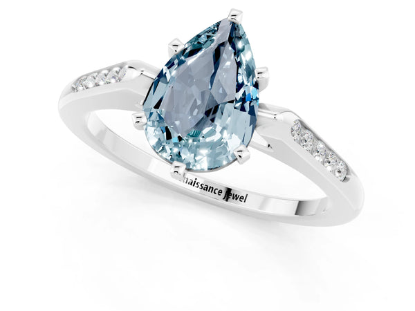 White gold Pear Cut Aquamarine Solitaire Ring with Channel Set Round Band and Prong Setting