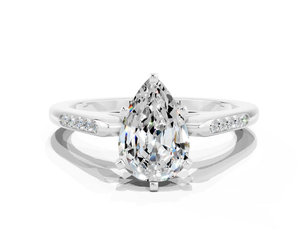 Platinum Pear Cut Moissanite Solitaire Ring with Channel Set Round Band and Prong Setting