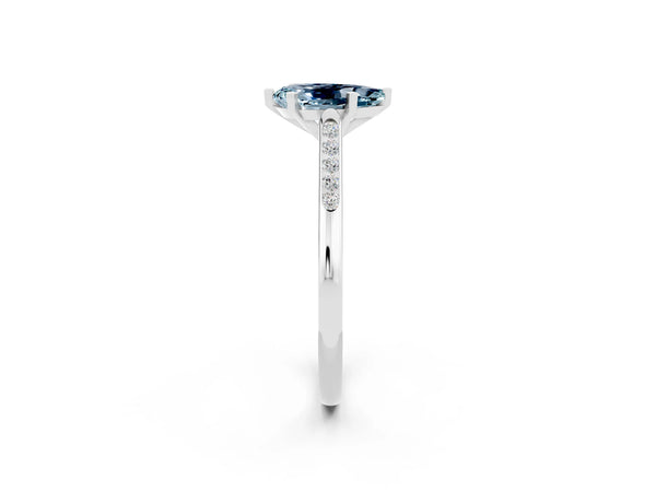 White gold Pear Cut Aquamarine Solitaire Ring with Channel Set Round Band and Prong Setting