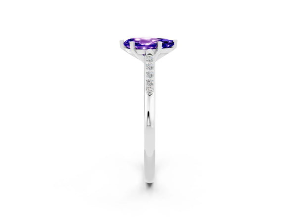 White gold Pear Cut Tanzanite Solitaire Ring with Channel Set Round Band and Prong Setting
