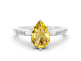 White gold Pear Cut Cut Channel Set Solitaire Engagement Ring with Four-Prong Setting
