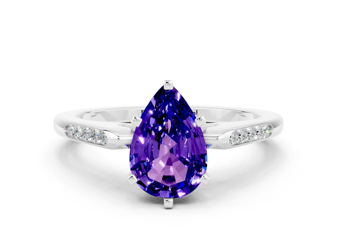 White gold Pear Cut Cut Channel Set Solitaire Engagement Ring with Four-Prong Setting