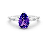 White gold Pear Cut Cut Channel Set Solitaire Engagement Ring with Four-Prong Setting