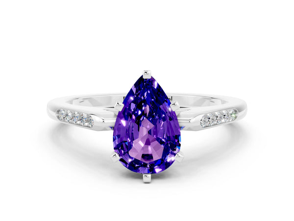 Platinum Pear Cut Tanzanite Solitaire Ring with Channel Set Round Band and Prong Setting