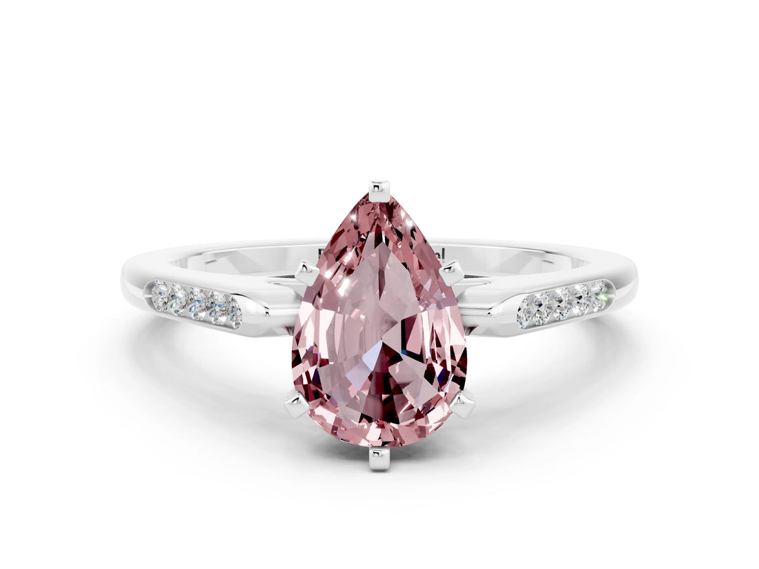 White gold Pear Cut Cut Channel Set Solitaire Engagement Ring with Four-Prong Setting